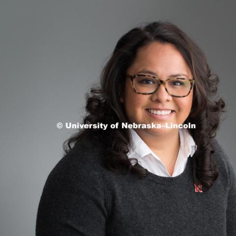 Studio portrait of Elvira Abrica, Assistant Professor, CEHS. August 12, 2016. Photo by Greg Nathan, University Communication Photography.